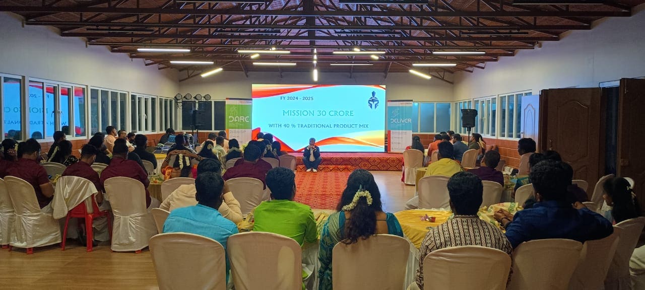 Modern conference room at LMS Palve Sugavasam Ooty with U-shaped seating, meeting tables, and business event setup.